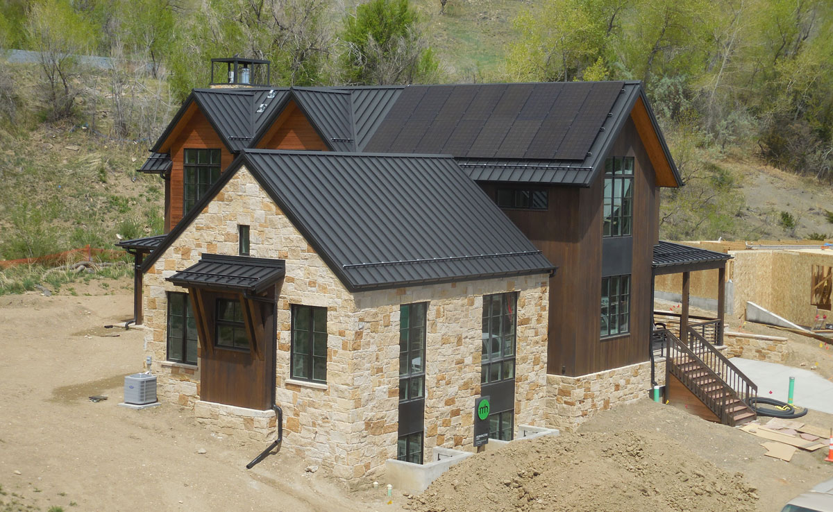 Elegant mountain home with one of our metal roofing systems